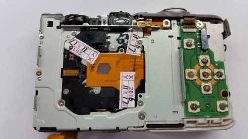 Reparar lente de camara Ixus